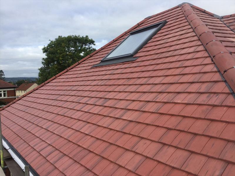 Tiled roof by Top Level Roofing & Building Solutions