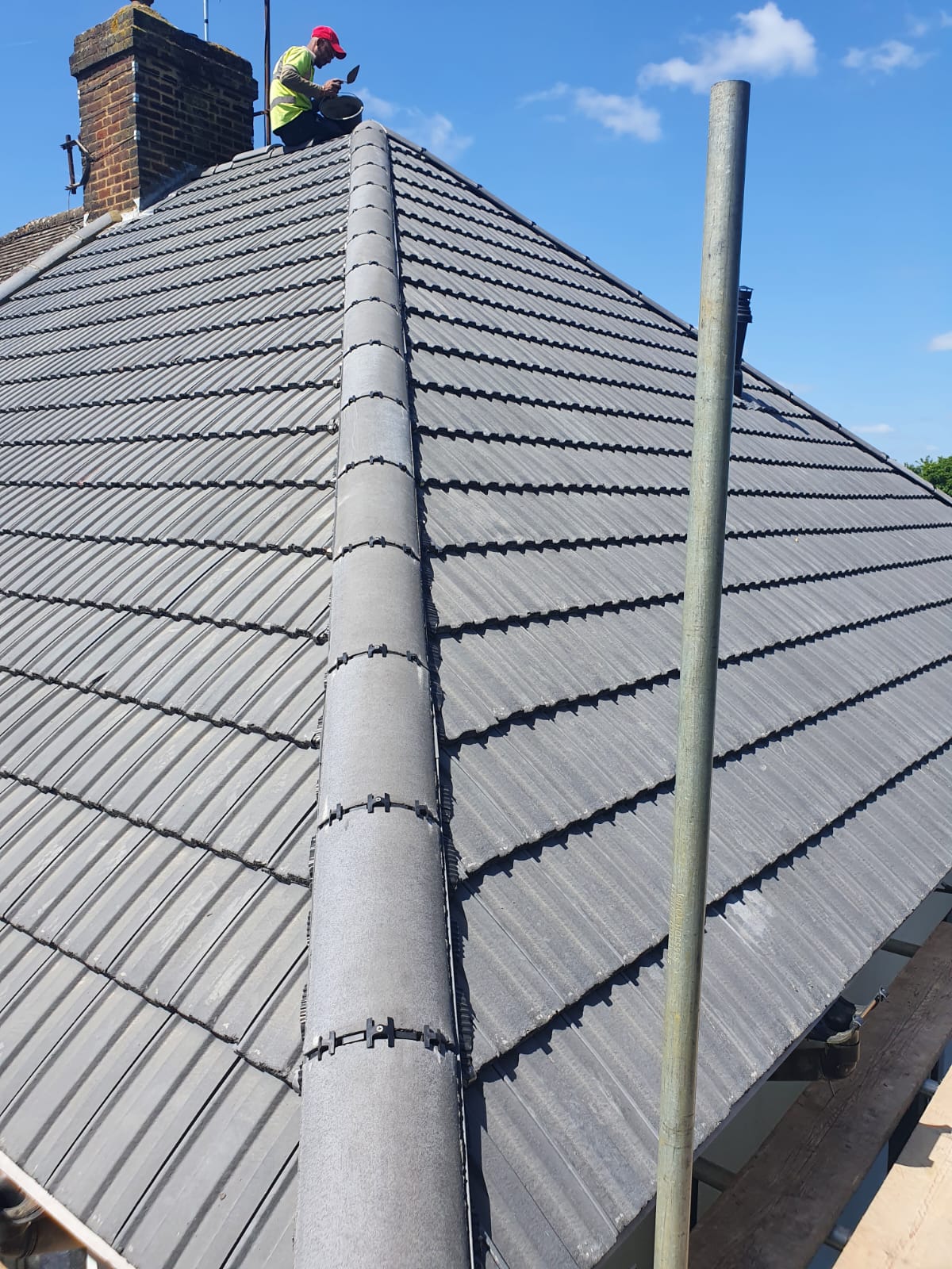 Tiled roof by Top Level Roofing & Building Solutions