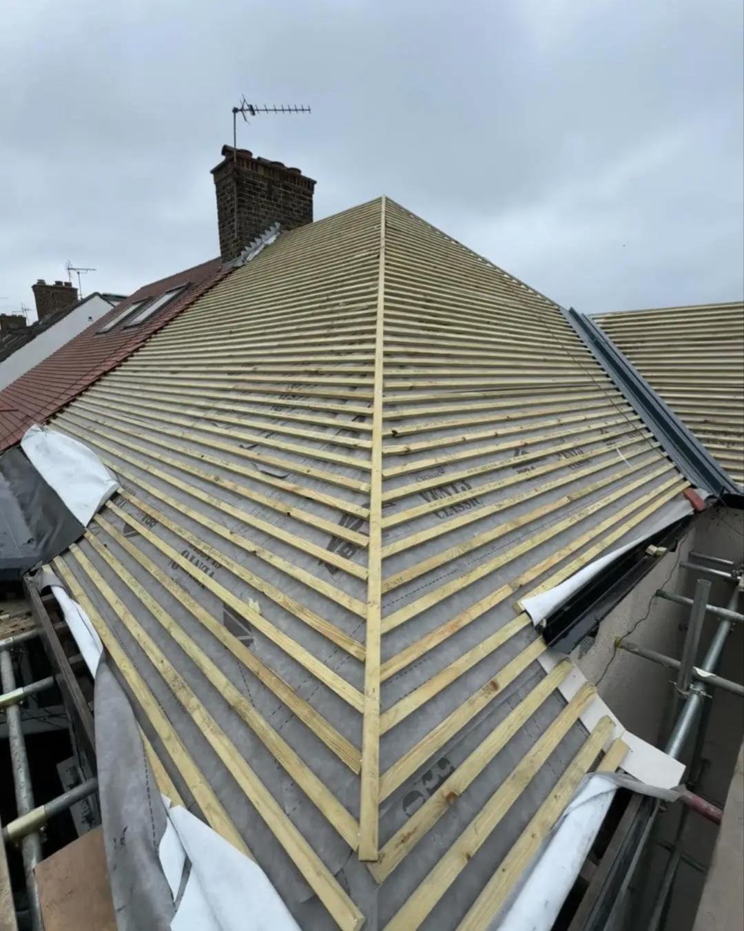 Tiled roof by Top Level Roofing & Building Solutions