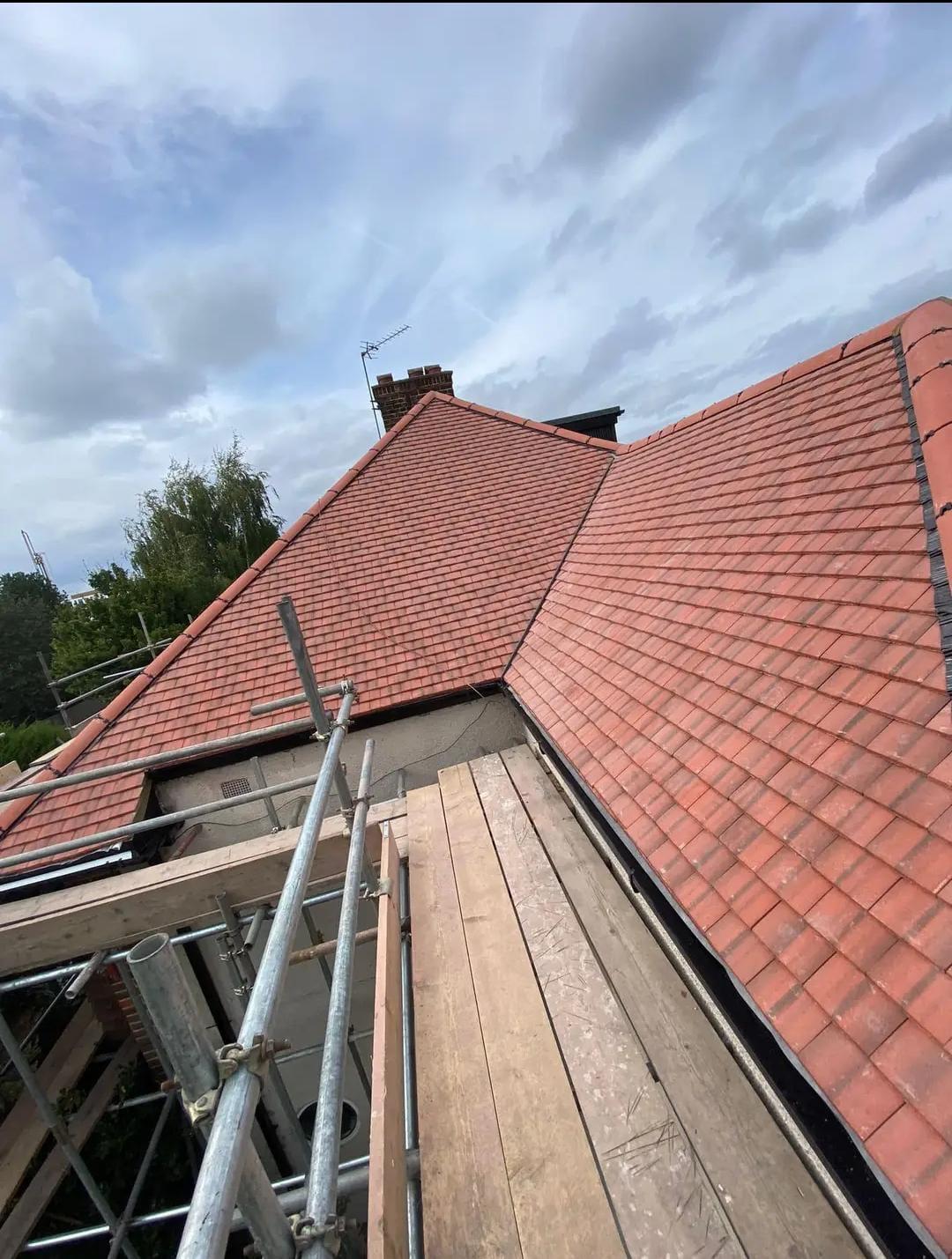 Tiled roof by Top Level Roofing & Building Solutions