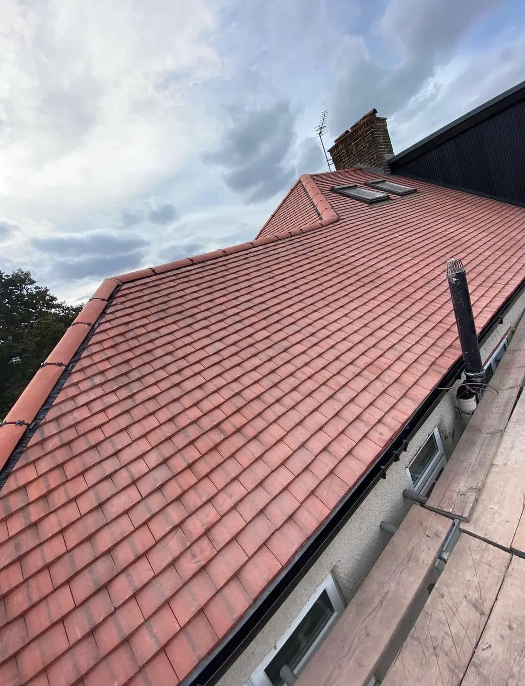 Tiled roof by Top Level Roofing & Building Solutions