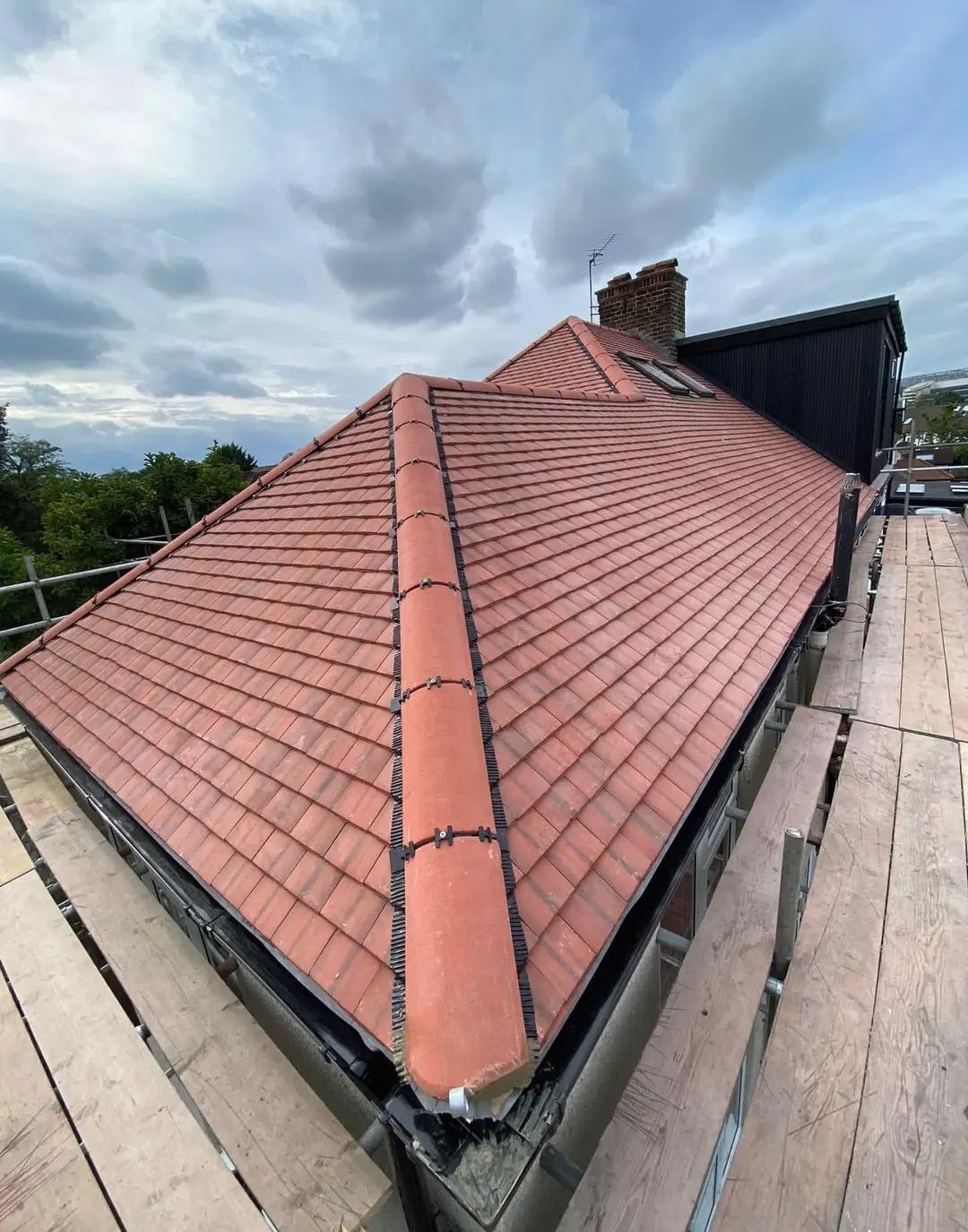 Tiled roof by Top Level Roofing & Building Solutions