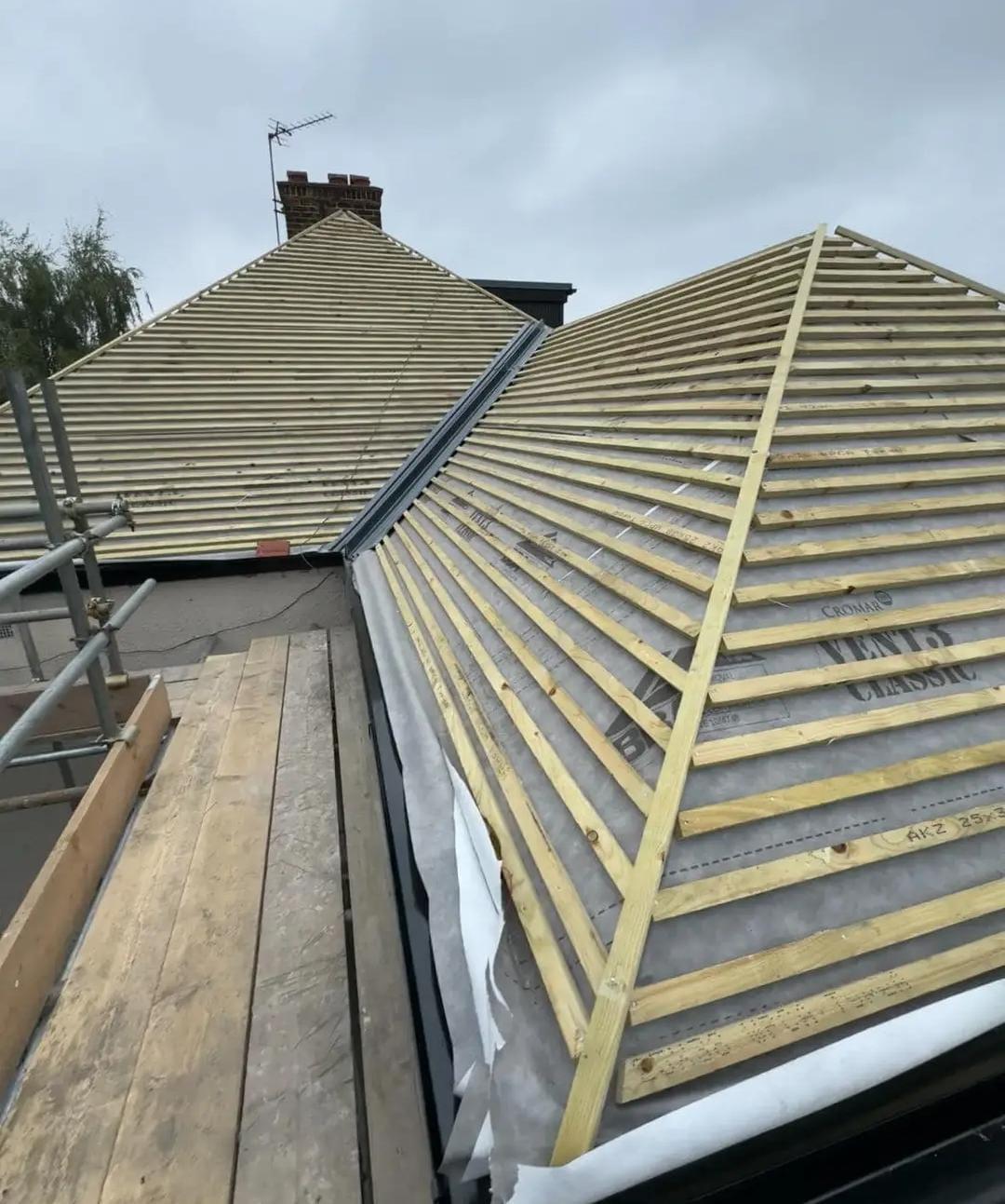 Tiled roof by Top Level Roofing & Building Solutions