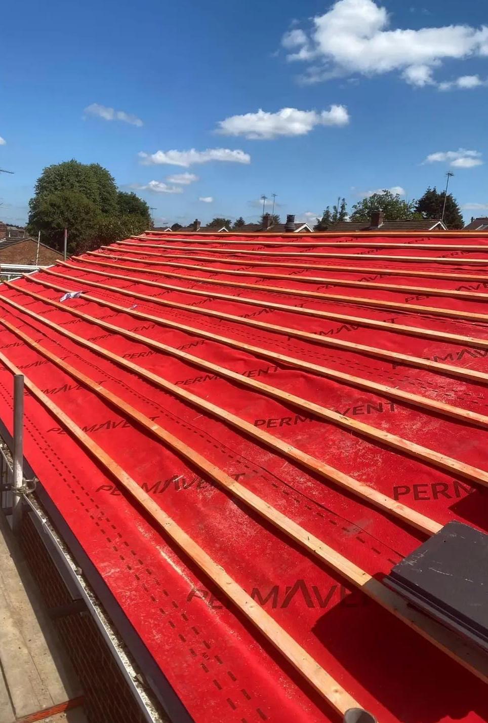 Tiled roof by Top Level Roofing & Building Solutions