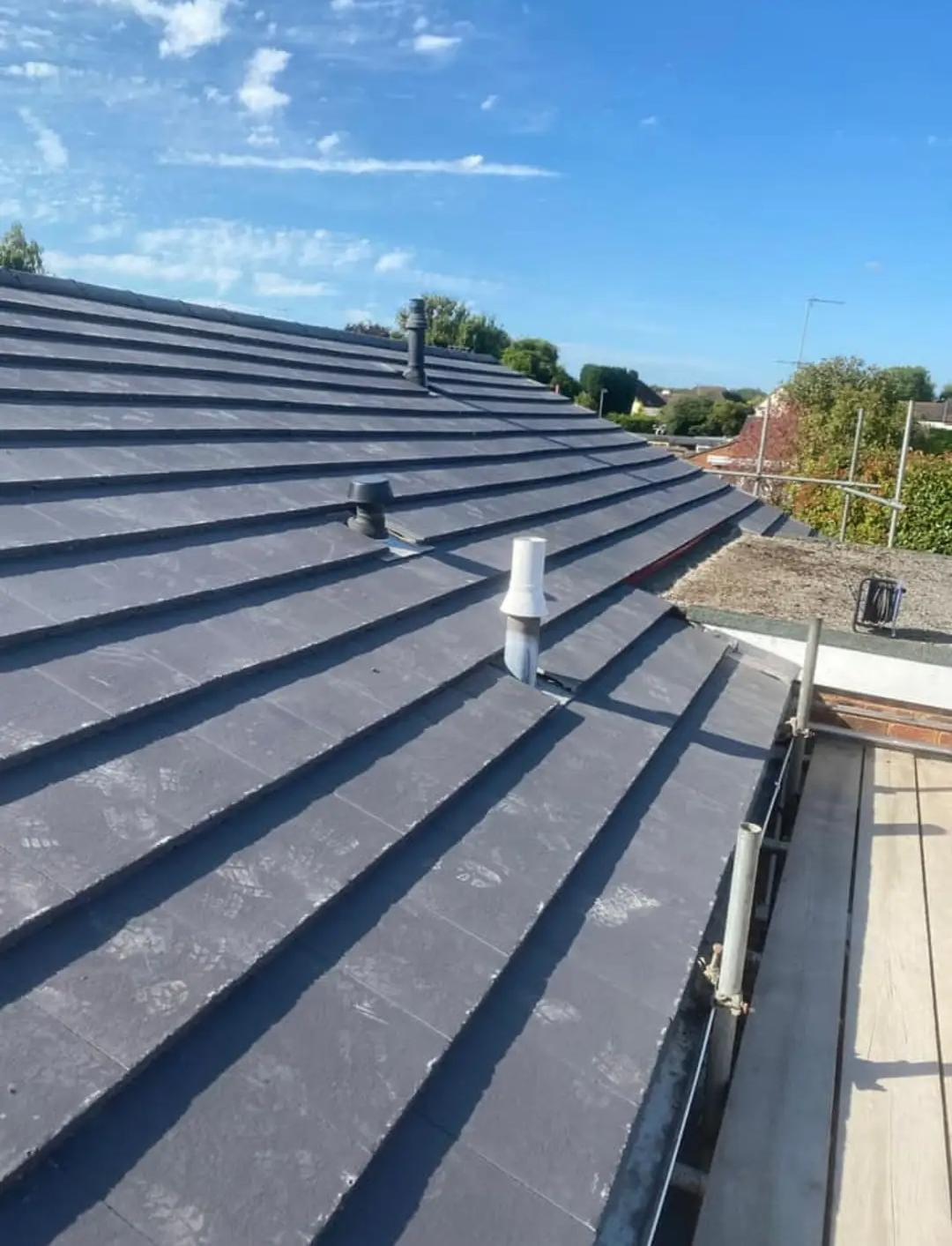 Slate roof by Top Level Roofing & Building Solutions