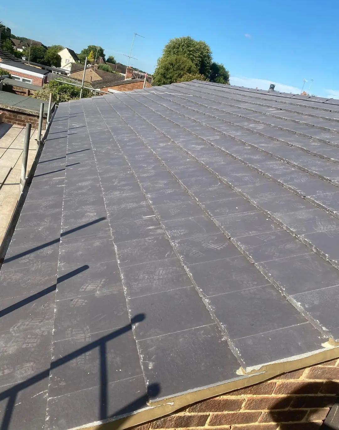 Slate roof by Top Level Roofing & Building Solutions