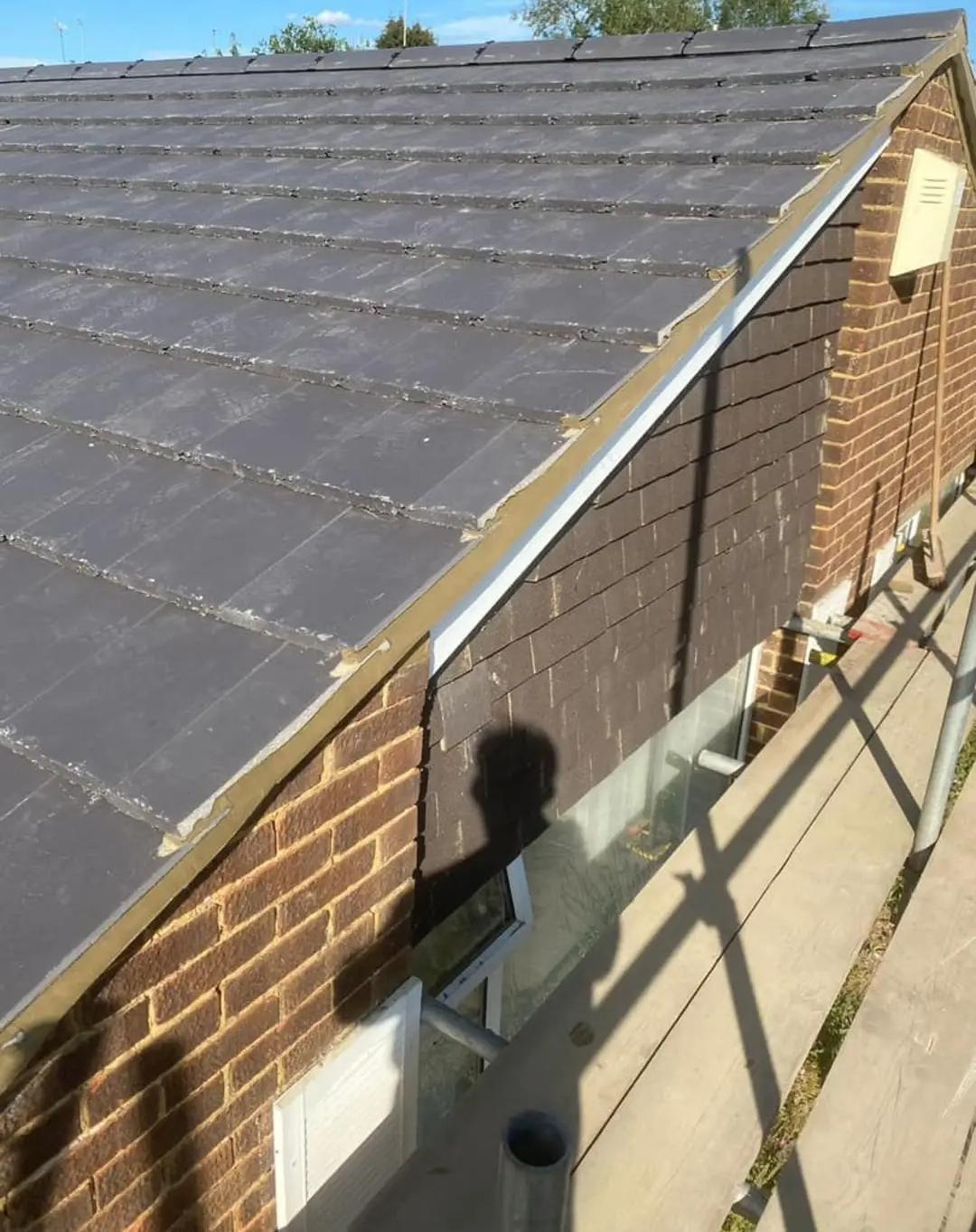 Slate roof by Top Level Roofing & Building Solutions