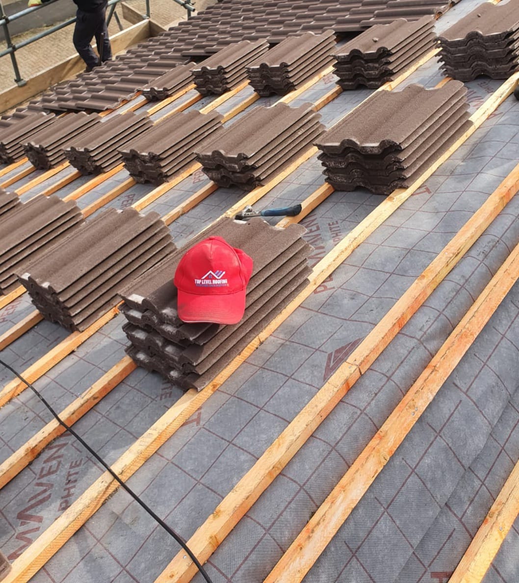 Roofing work in progress by Top Level Roofing & Building Solutions