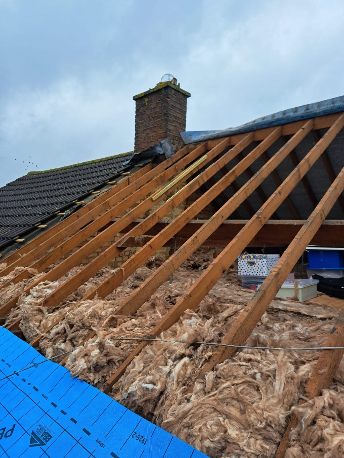Roofing work in progress by Top Level Roofing & Building Solutions