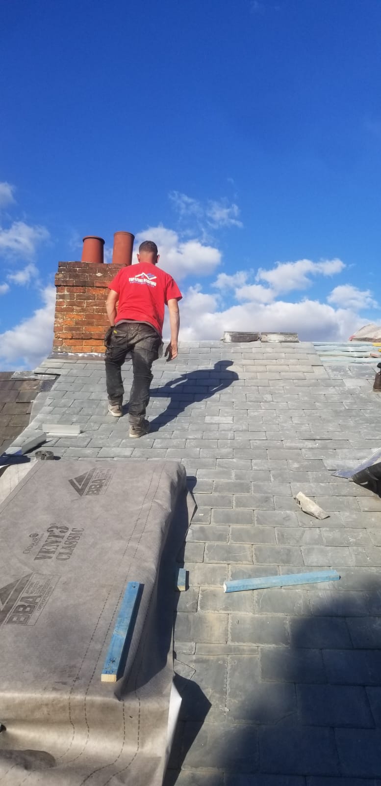 Roofing work in progress by Top Level Roofing & Building Solutions