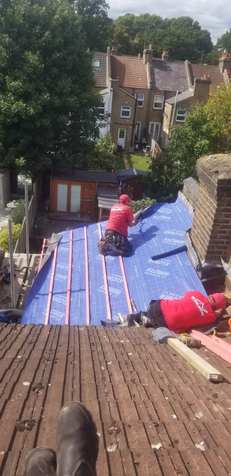 Roofing work in progress by Top Level Roofing & Building Solutions