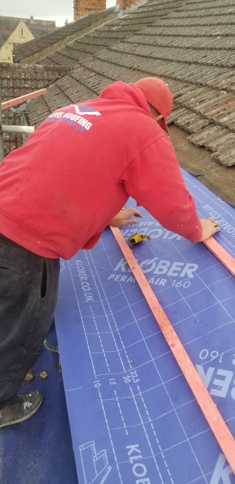 Roofing work in progress by Top Level Roofing & Building Solutions