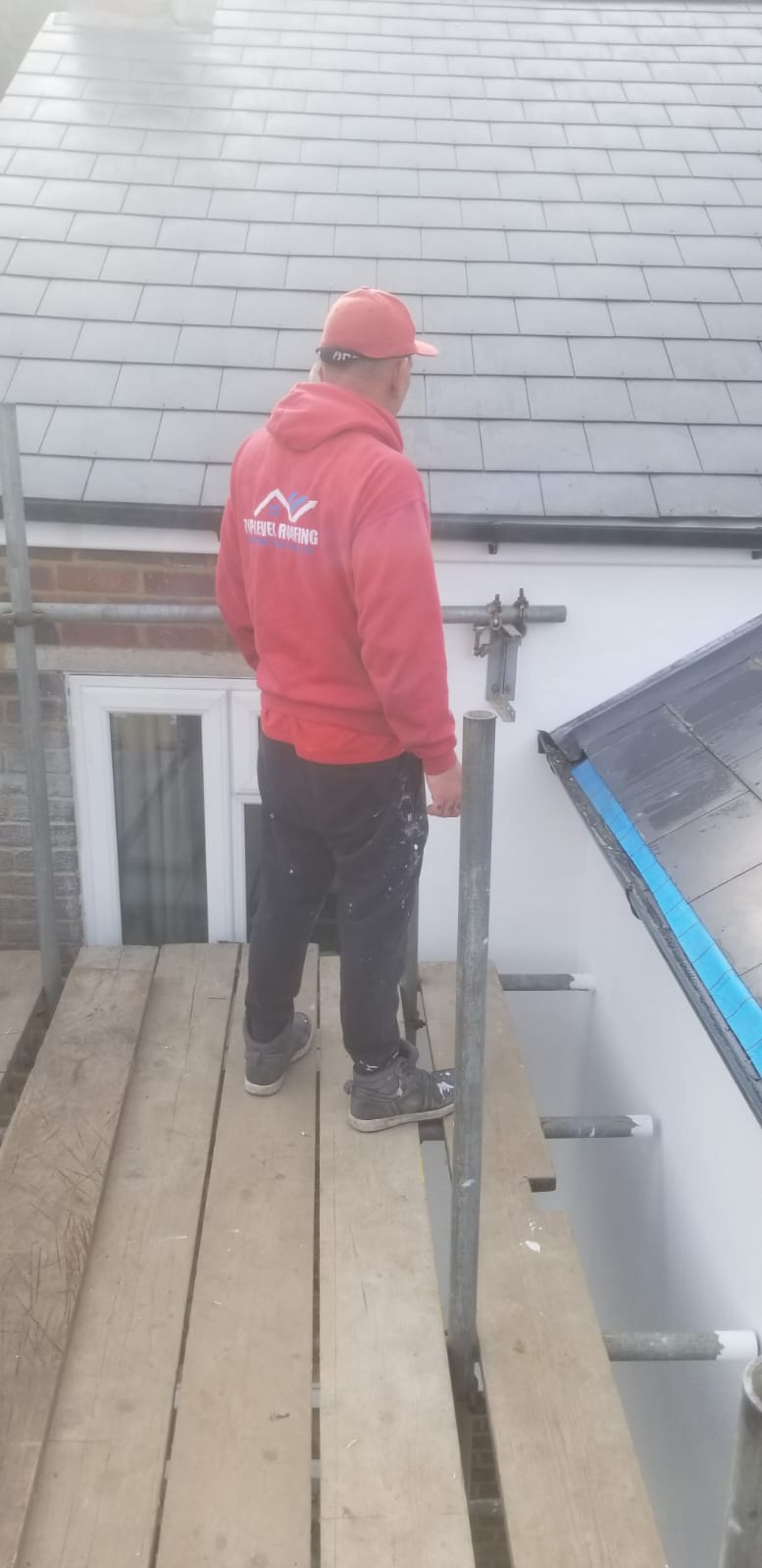 Roofing work in progress by Top Level Roofing & Building Solutions