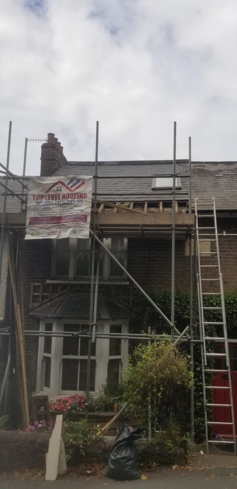 Roofing work in progress by Top Level Roofing & Building Solutions
