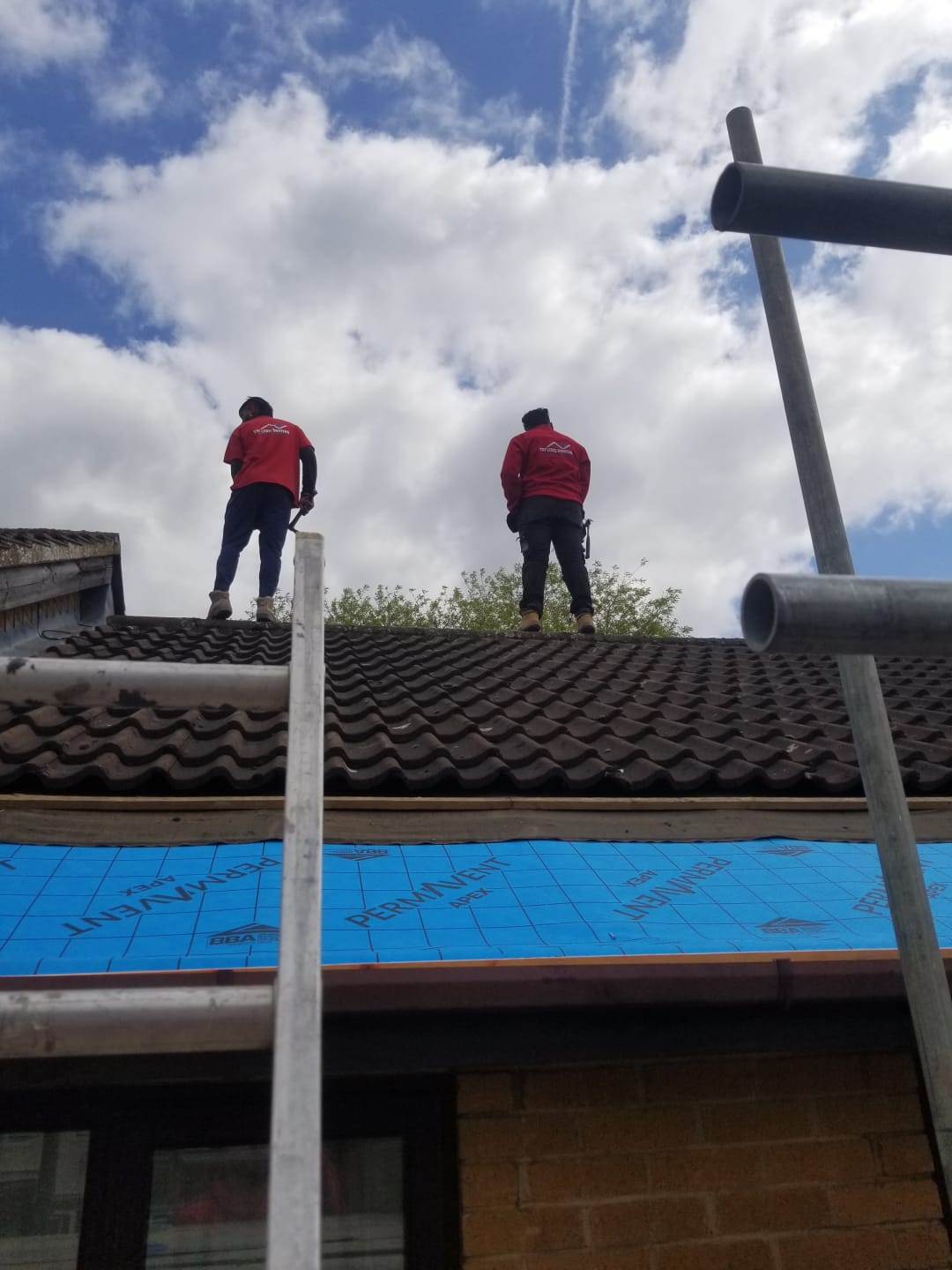 Roofing work in progress by Top Level Roofing & Building Solutions