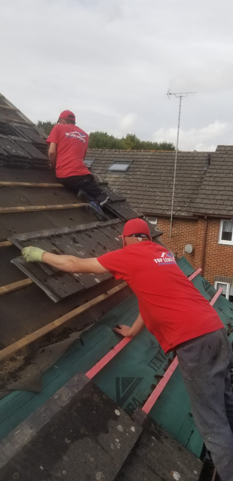 Re-roof in progress by Top Level Roofing & Building Solutions