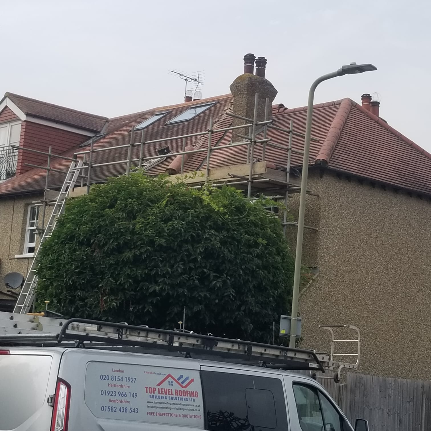 Roofing work in progress by Top Level Roofing & Building Solutions