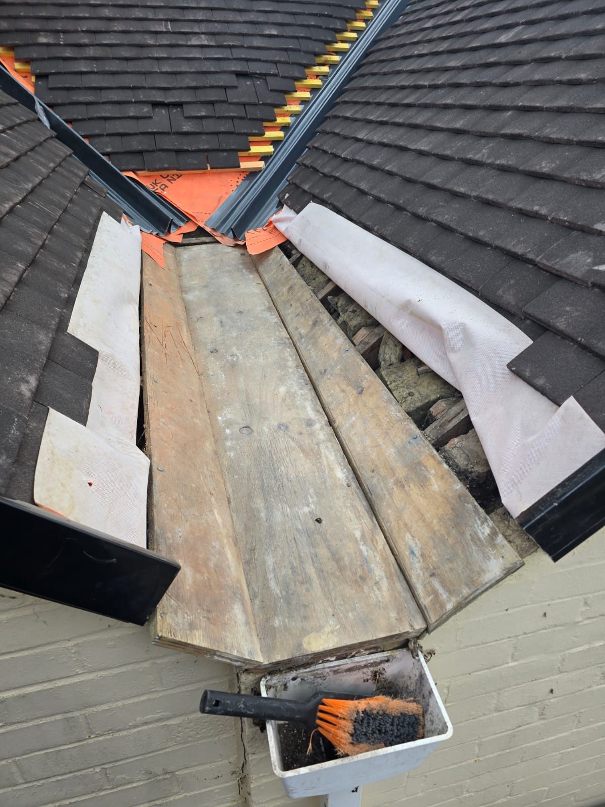 A twin valley stripped to the boards during a re-roof by Top Level Roofing & Building Solutions