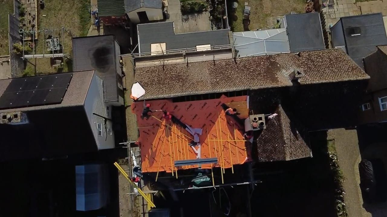 Drone view of a new roof being installed over membrane and battens by Top Level Roofing & Building Solutions