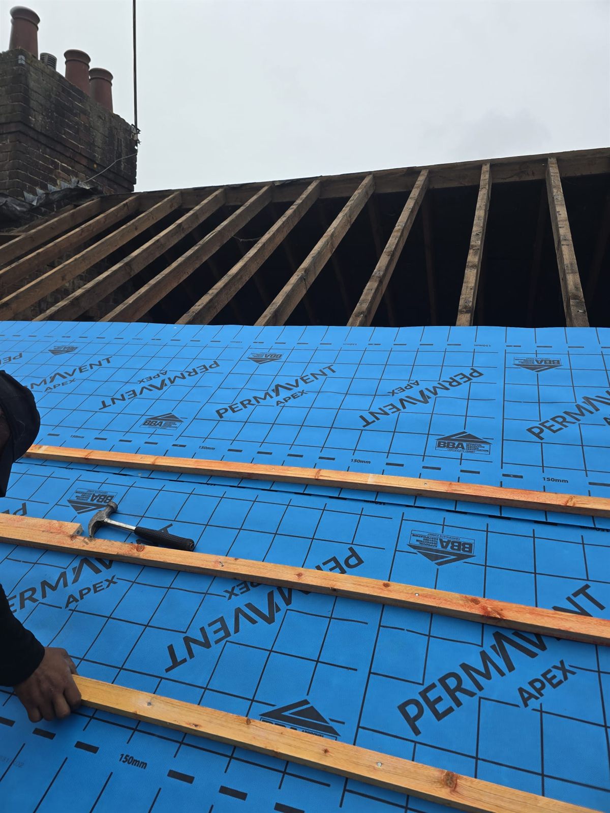New Permavent breathable membrane and battens on a re-roof by Top Level Roofing & Building Solutions